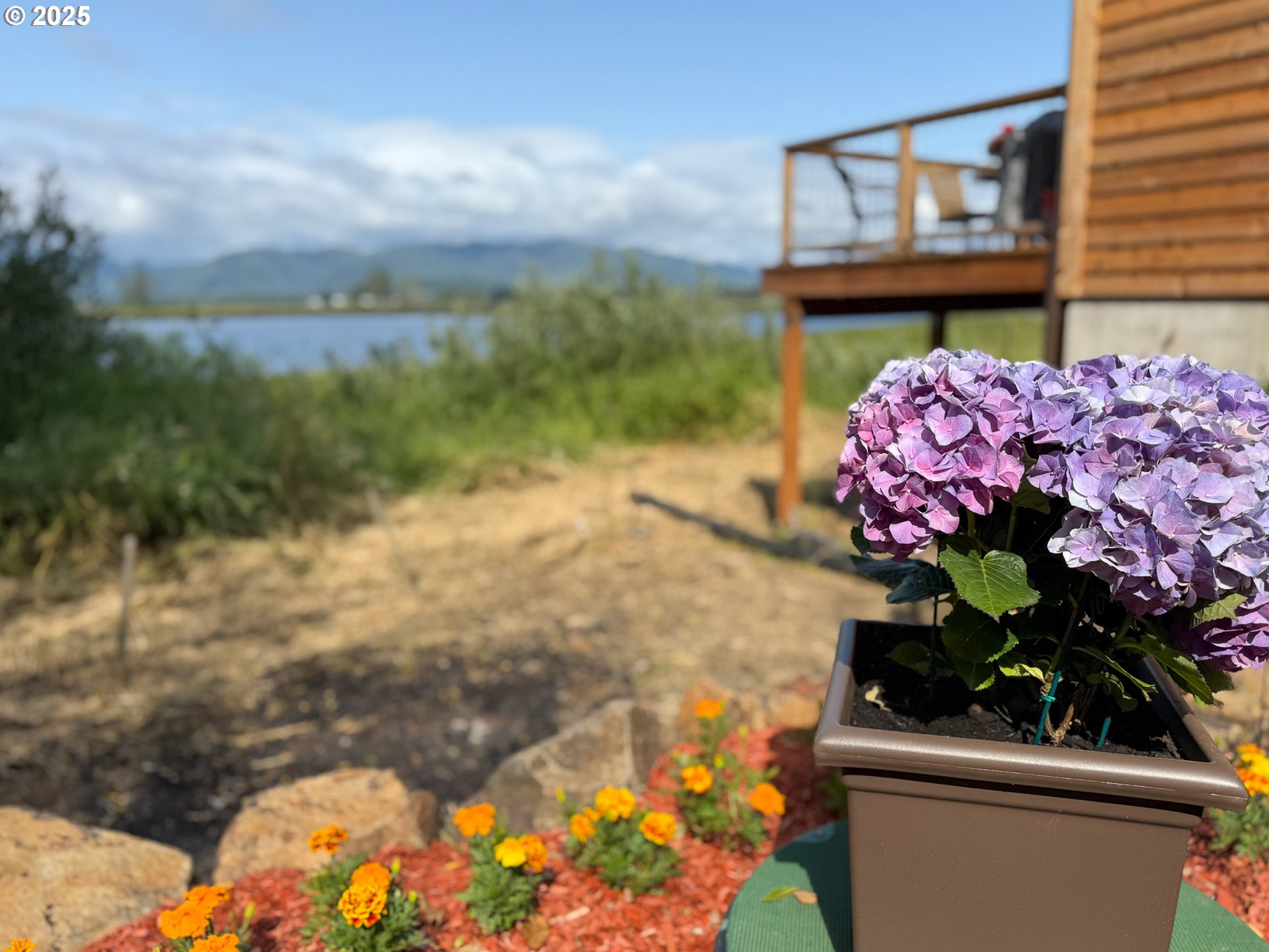 2375 Bayocean Road Northwest Tillamook, OR 97141 - Photo 32 of 37 a view of a house with a yard