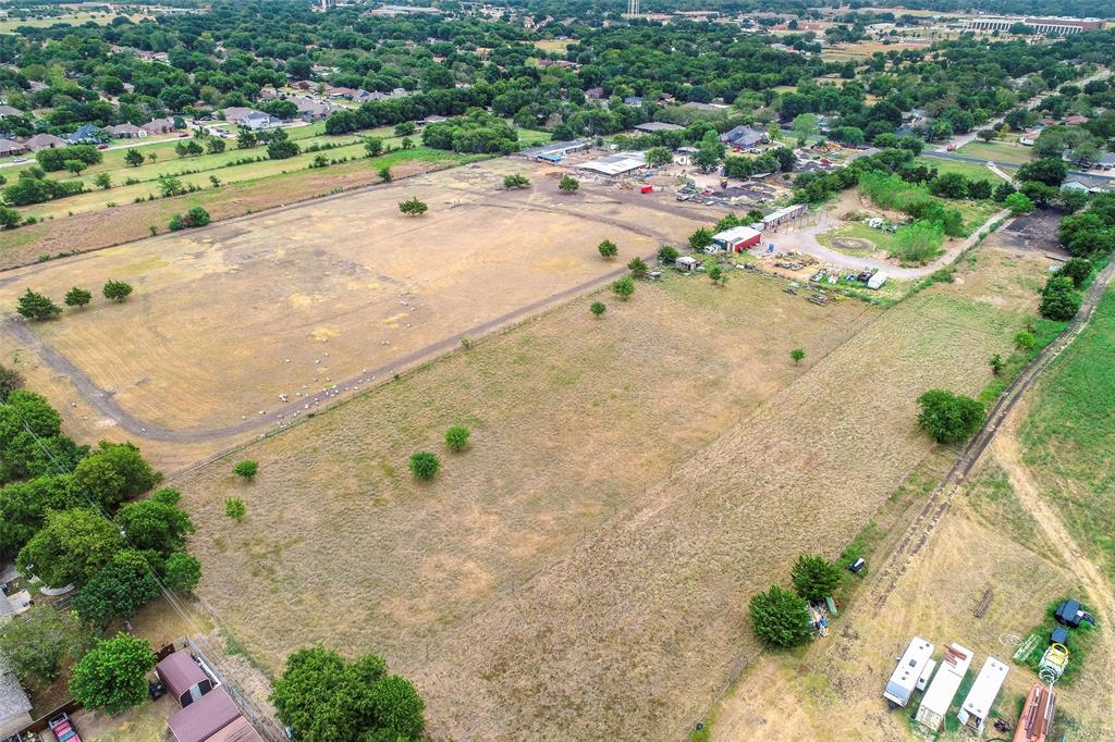 909 Donlee Road Lancaster, TX 75134 - Photo 3 of 10 an aerial view of a houses with a yard