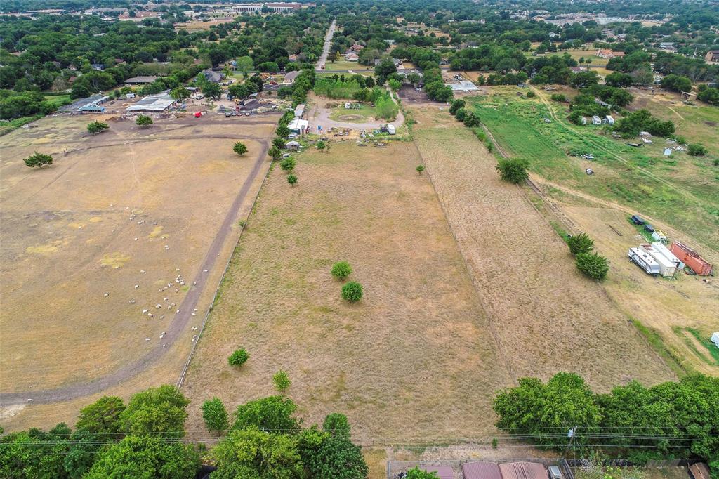 909 Donlee Road Lancaster, TX 75134 - Photo 5 of 10 an aerial view of a house with a yard and lake view