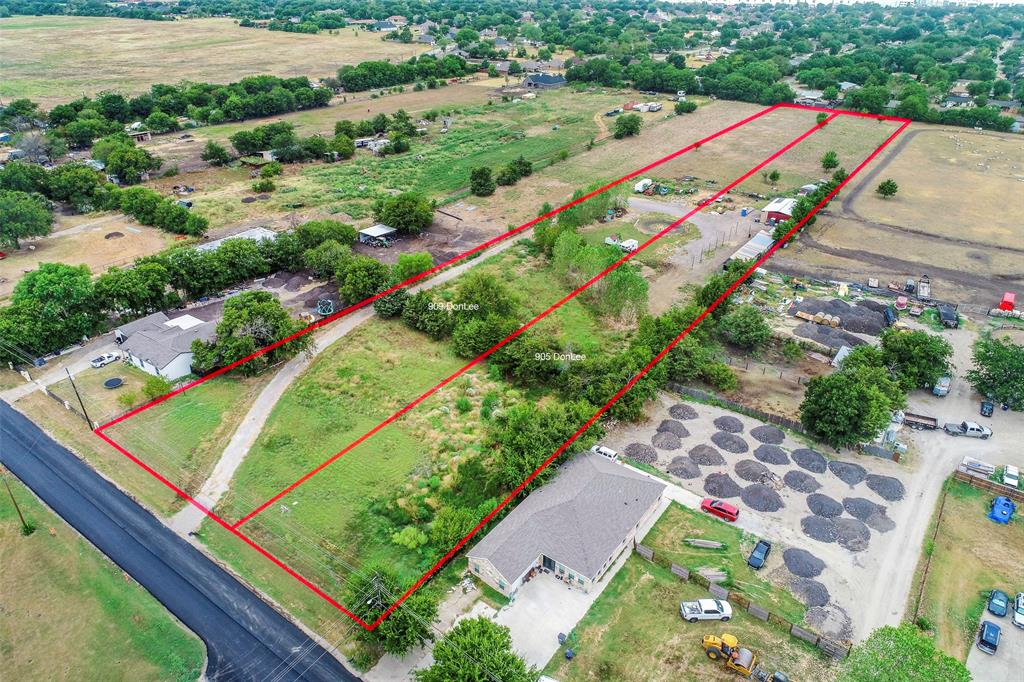 909 Donlee Road Lancaster, TX 75134 - Photo 7 of 10 an aerial view of a tennis ground and a cars park side of the road