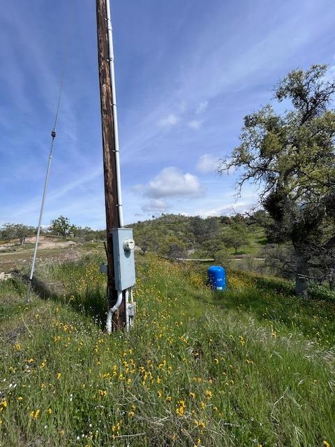 23710 Loper Valley Road Prather, CA 93651 - Photo 11 of 35 Power and water pressure pump at pad
