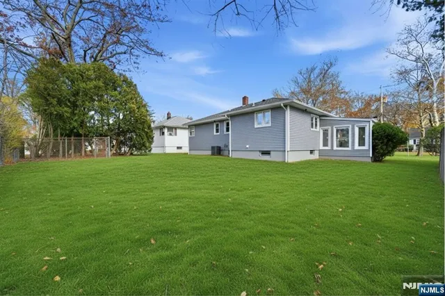 a view of a house with a big yard