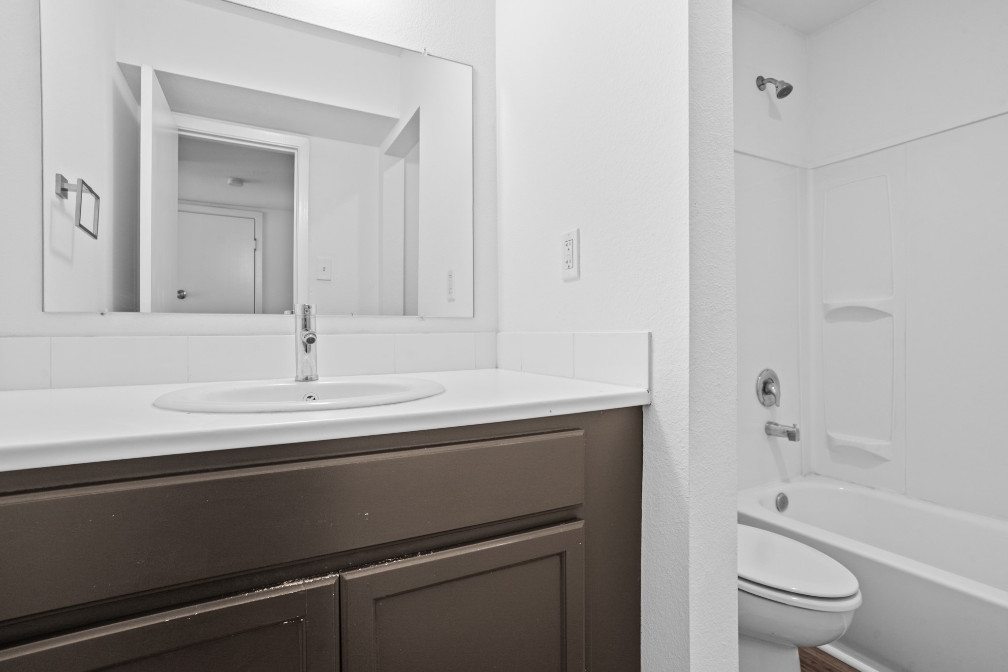 1408 Hughes Street, Unit 4 Houston, TX 77023 - Photo 26 of 27 Get ready for your day in this bright, clean and updated bath.