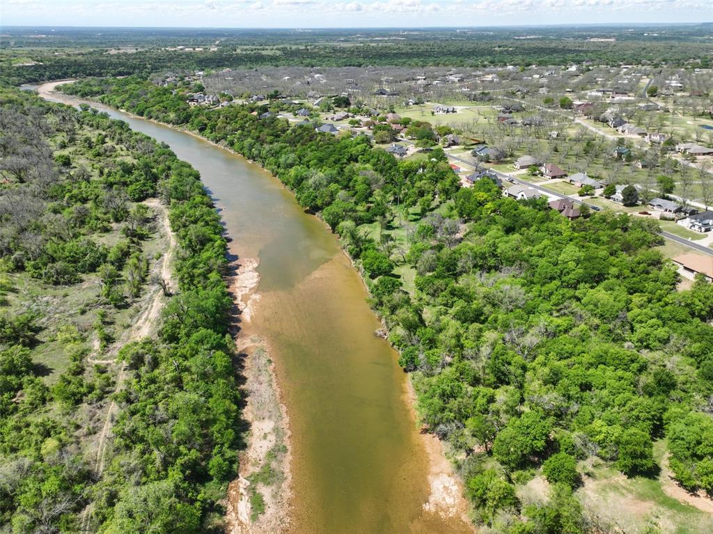 9804 Bellechase Road Granbury, TX 76049 - Photo 3 of 18 Brazos River frontage with mature tree coverage and natural elevation.