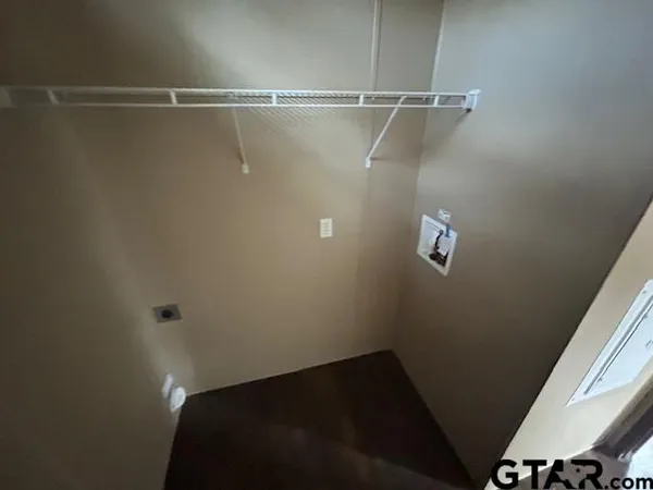 a view of a room with racks on the wall