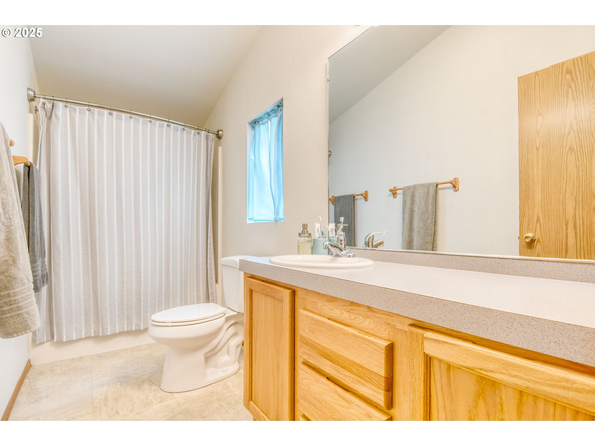 216 East Washington Street Athena, OR 97813 - Photo 14 of 27 a bathroom with a sink toilet and a mirror