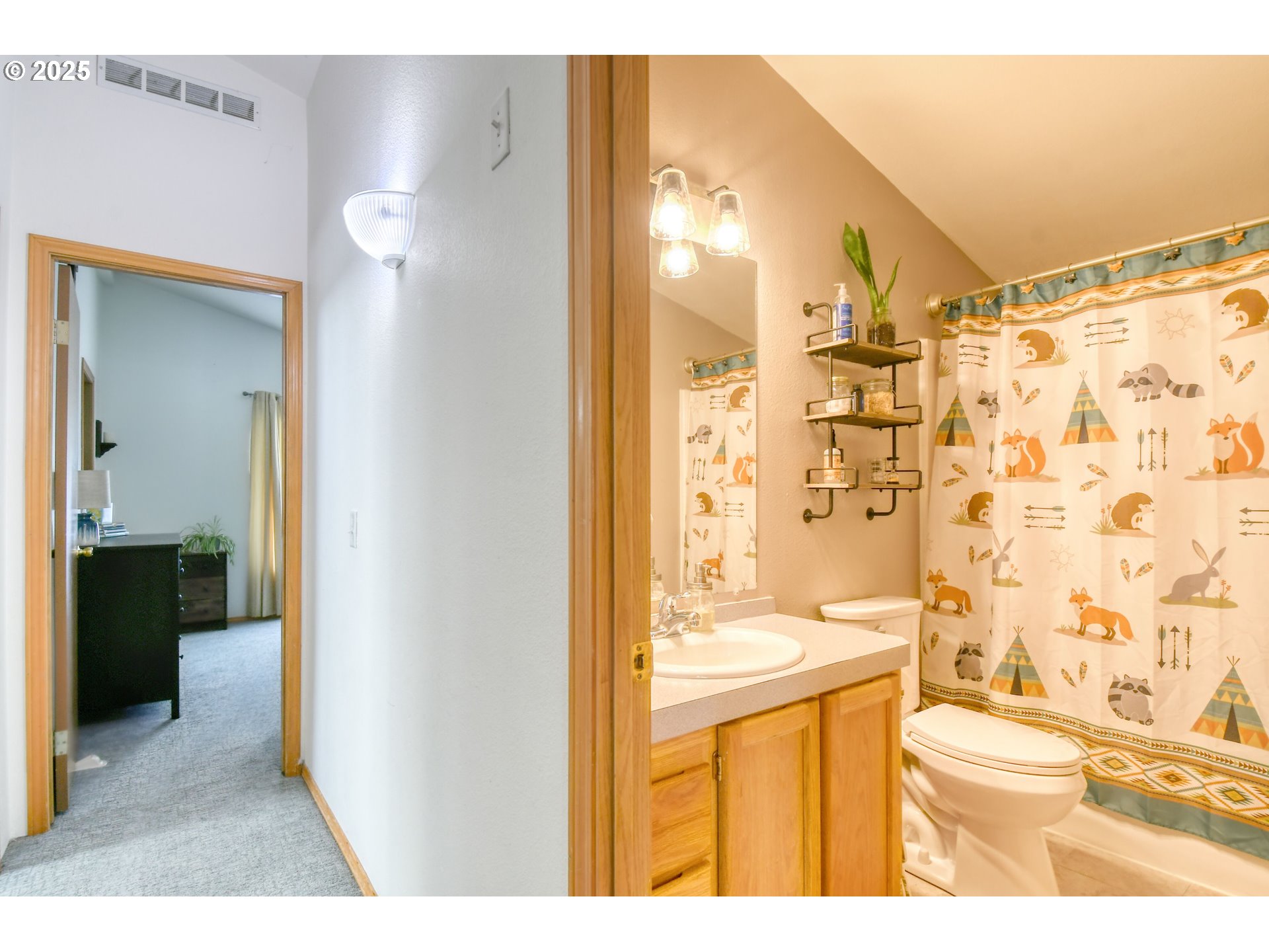 216 East Washington Street Athena, OR 97813 - Photo 19 of 27 a bathroom with a granite countertop sink toilet and shower