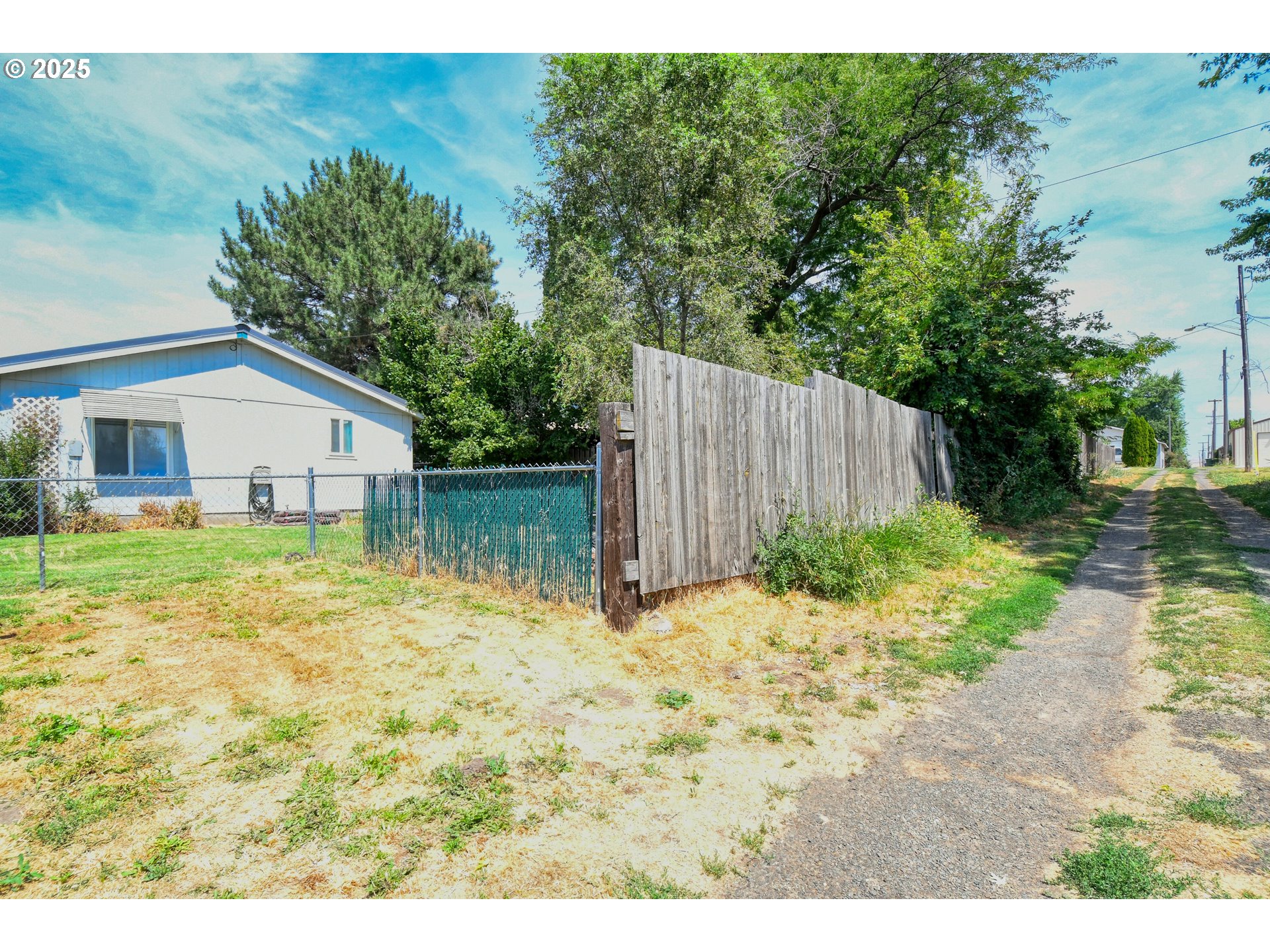 216 East Washington Street Athena, OR 97813 - Photo 27 of 27 a view of house with backyard and garden