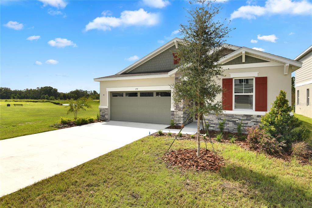 175 Flag Lilly Lane Umatilla, FL 32784 - Photo 1 of 1 a house view with a garden space