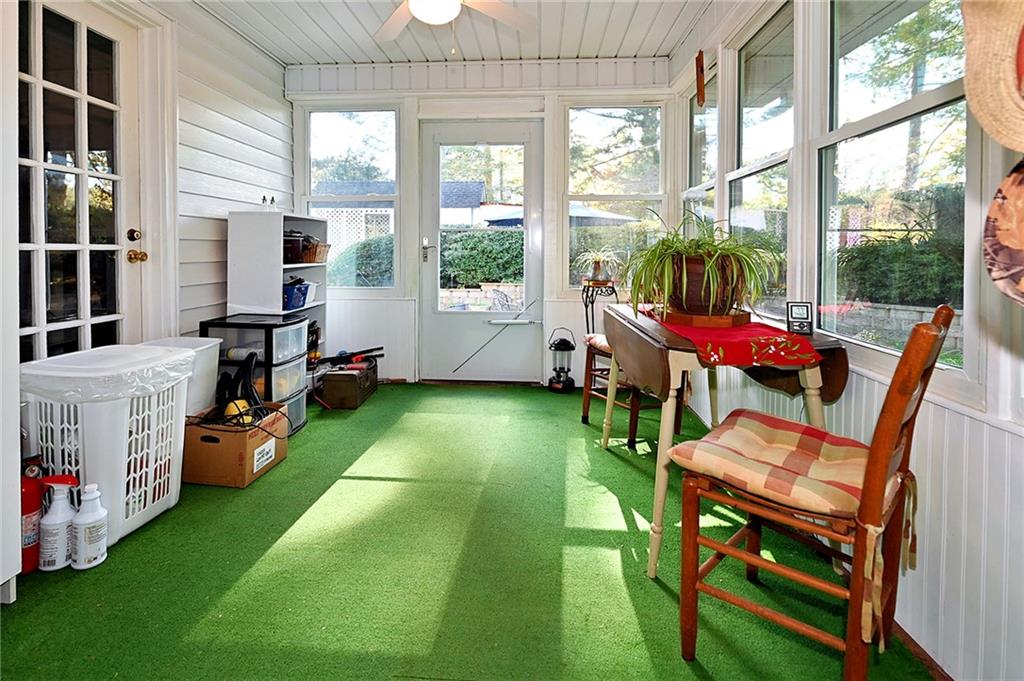 5937 Thompson Bridge Road Murrayville, GA 30564 - Photo 17 of 54 a room with furniture and a large window