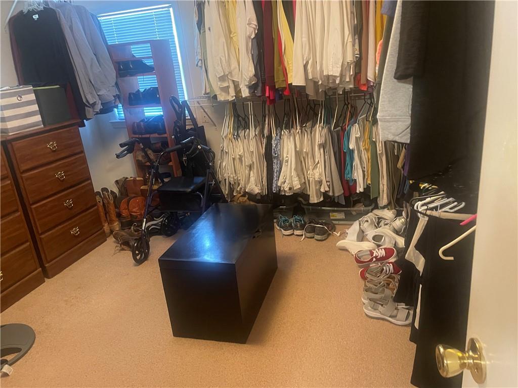 5937 Thompson Bridge Road Murrayville, GA 30564 - Photo 30 of 54 a room with gym equipment and a large mirror