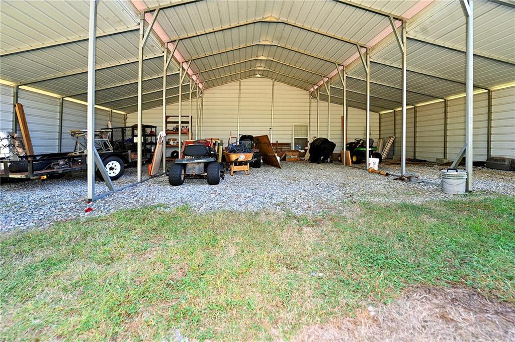 5937 Thompson Bridge Road Murrayville, GA 30564 - Photo 42 of 54 a view of a room with gym equipment