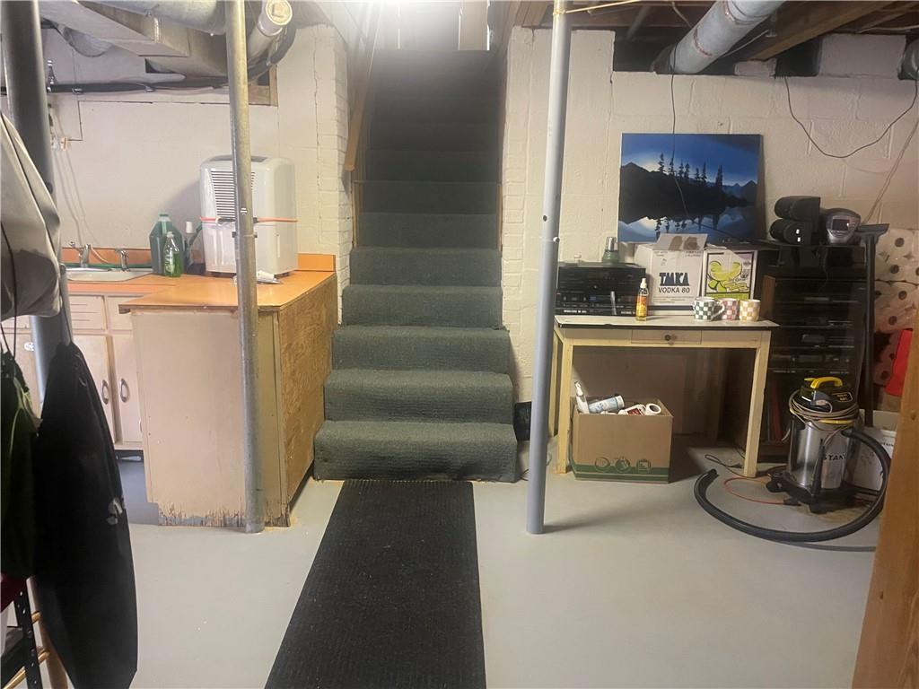 5937 Thompson Bridge Road Murrayville, GA 30564 - Photo 47 of 54 a room with water heater and utility racks