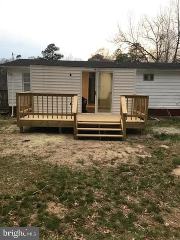 a view of a house with a roof deck