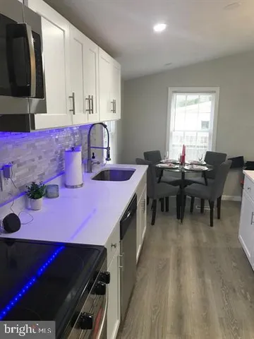 a view of a dining room with furniture