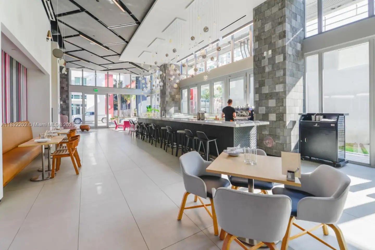 227 Northeast 2nd Street, Unit 2508 Miami, FL 33132 - Photo 19 of 28 a view of a dining room with furniture window and outside view