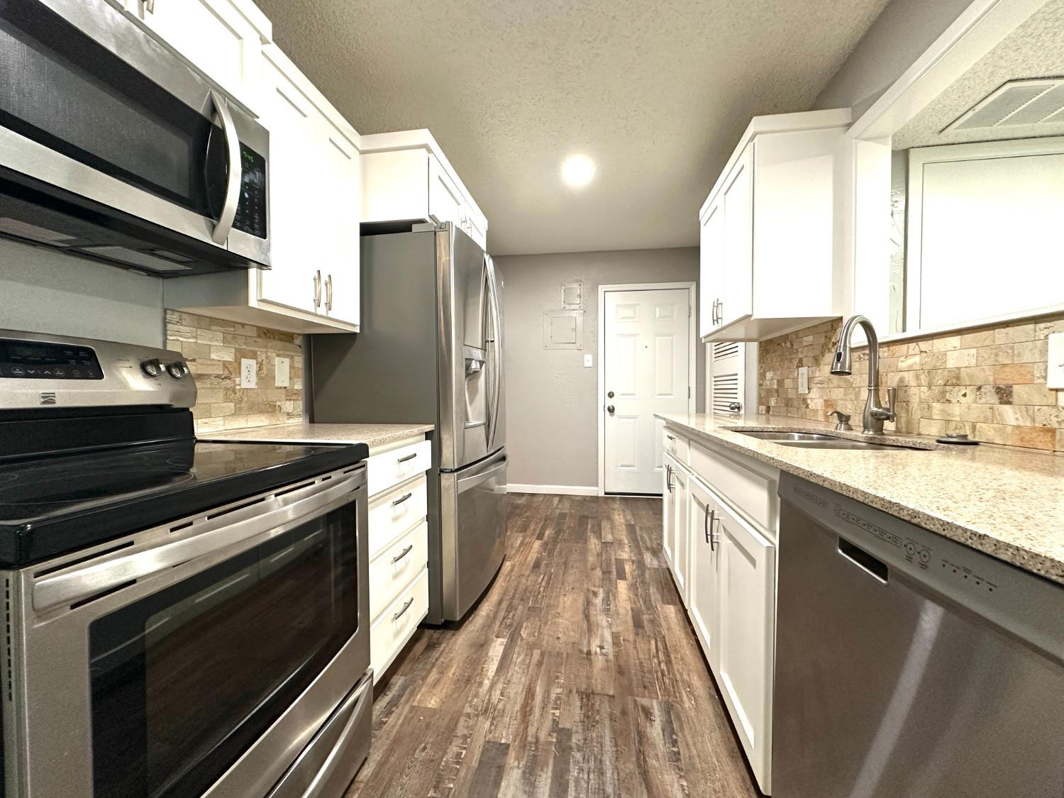6911 Gary Avenue, Unit A Lubbock, TX 79413 - Photo 4 of 12 Photo 4