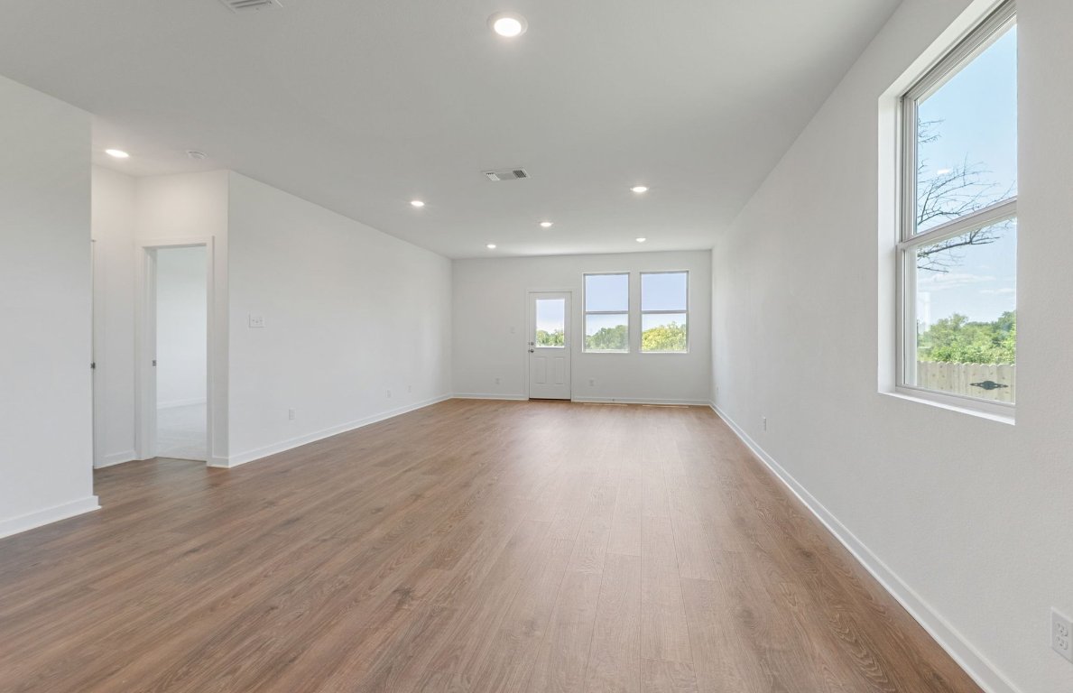 3003 Gillespie Court Temple, TX 76501 - Photo 9 of 17 a view of empty room with wooden floor and fan