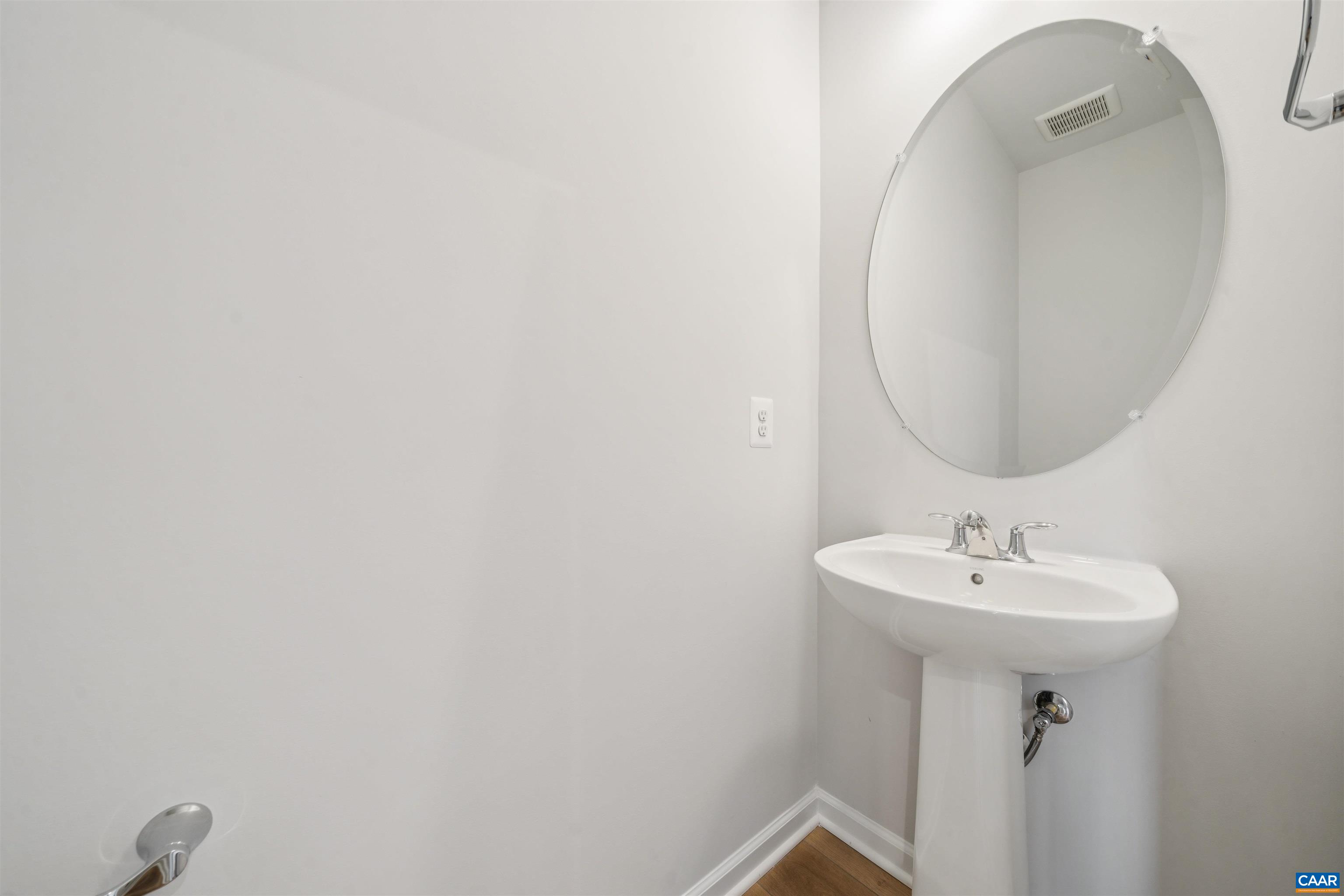 3035 Rambling Brk Lane Crozet, VA 22932 - Photo 13 of 45 a bathroom with a sink and mirror