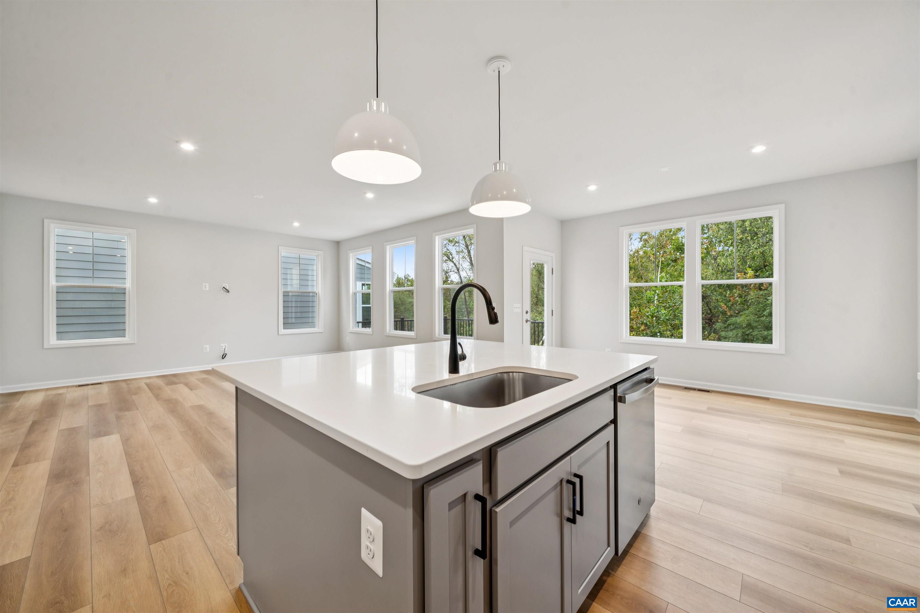 3035 Rambling Brk Lane Crozet, VA 22932 - Photo 16 of 45 a kitchen that has a sink and a large window