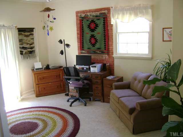 5223 Revere Road Durham, NC 27713 - Photo 6 of 6 a living room with furniture and a window