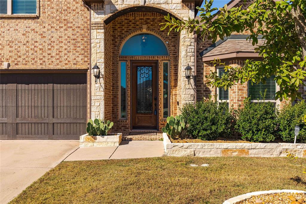 1008 Hummingbird Court Forney, TX 75126 - Photo 2 of 34 a front view of house with yard