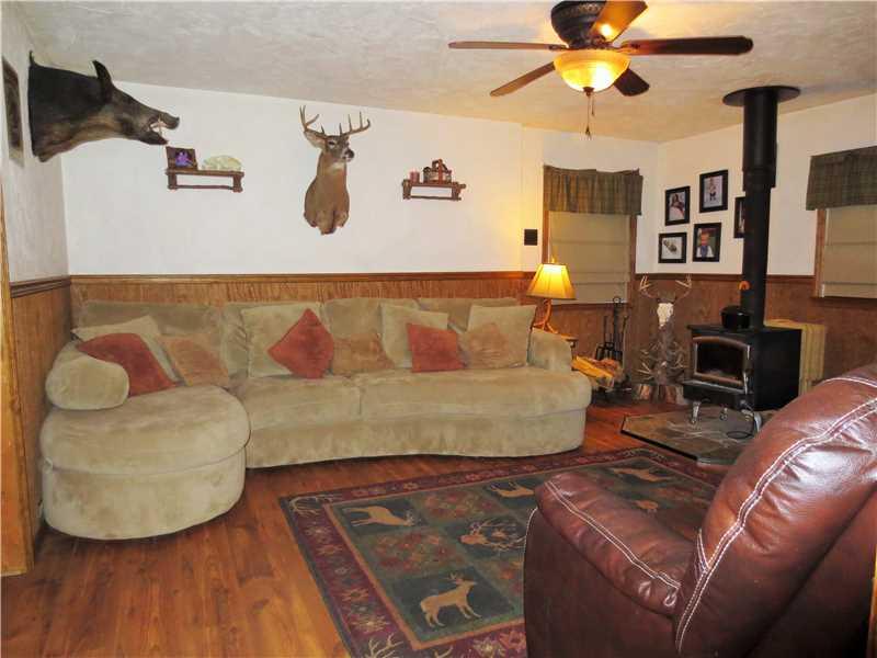 555 Sarver Road Sarver, PA 16055 - Photo 6 of 20 Living Room. With a wood burner