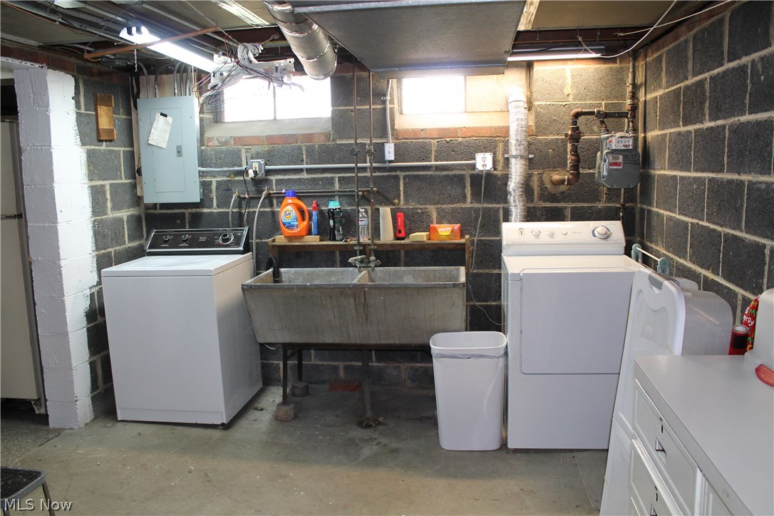 1189 Argonne Road Cleveland, OH 44121 - Photo 23 of 30 Basement laundry--washer and dryer included! New water inputs and updated electrical box all on 100 amp service.