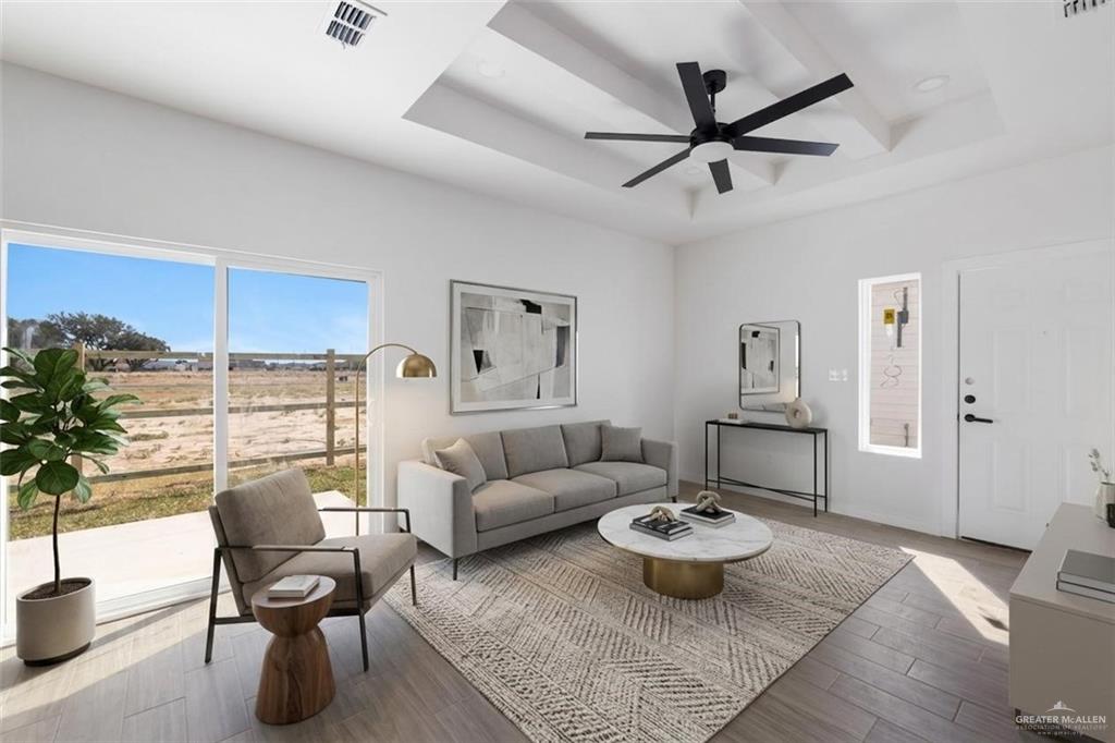 2902 Gabriel Street, Unit 2 Mission, TX 78574 - Photo 3 of 15 a living room with furniture and a large window