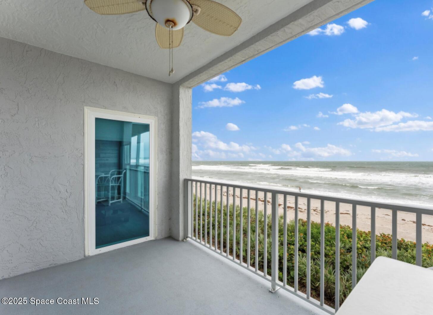 3037 S Highway, Unit 2C Melbourne Beach, FL 32951 - Photo 29 of 48 a view of a balcony