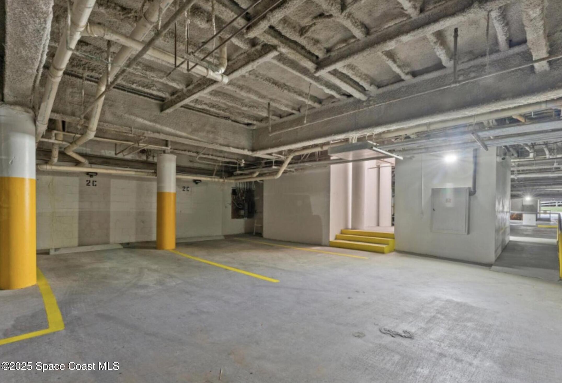3037 S Highway, Unit 2C Melbourne Beach, FL 32951 - Photo 41 of 48 a view of an empty room with windows