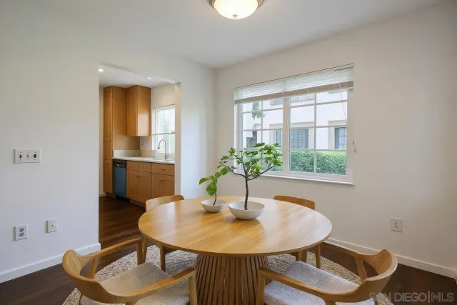 a kitchen with stainless steel appliances granite countertop a stove a microwave and a refrigerator