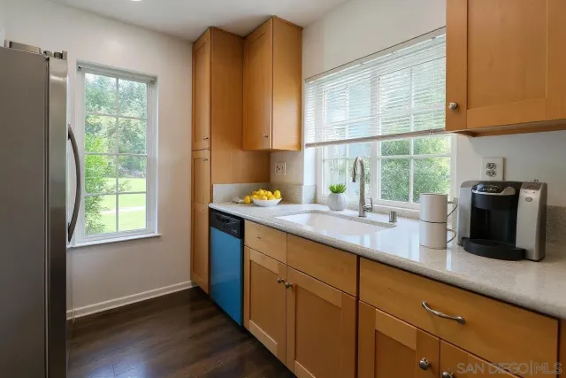 a spacious bedroom with a bed and a couch