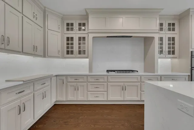 a view of kitchen with furniture and a ceiling fan