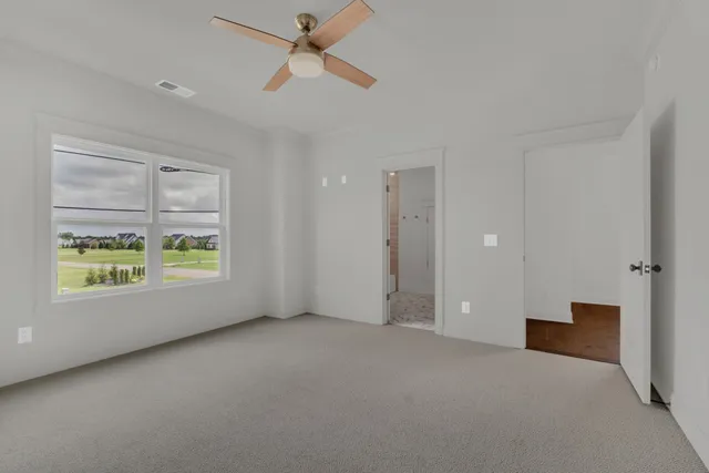 a view of a room with racks on the wall