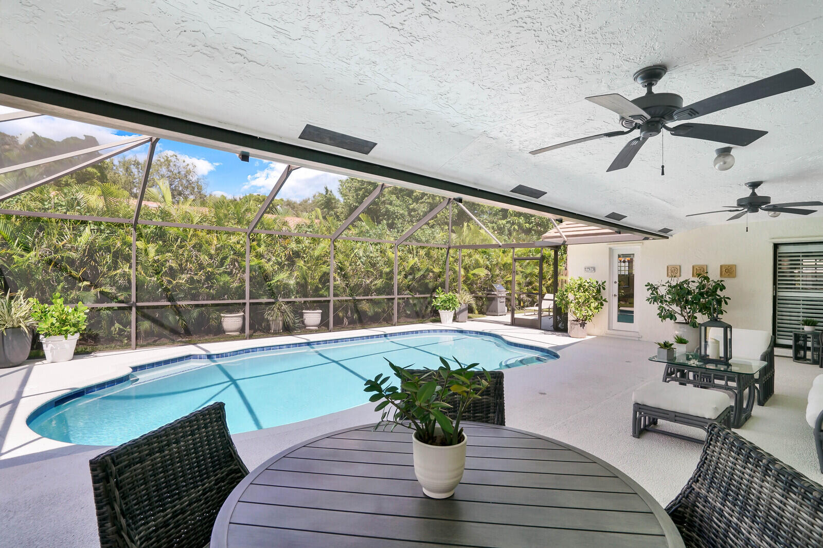 2641 Northwest 38th Street Boca Raton, FL 33434 - Photo 32 of 42 Screened Pool & Patio