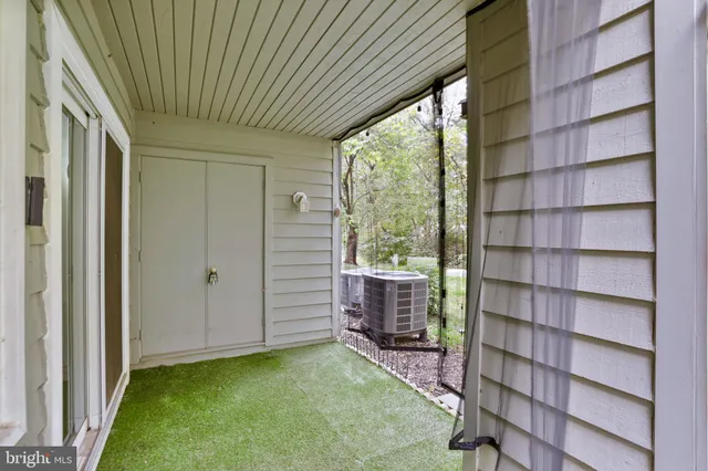 a view of room with window and closet