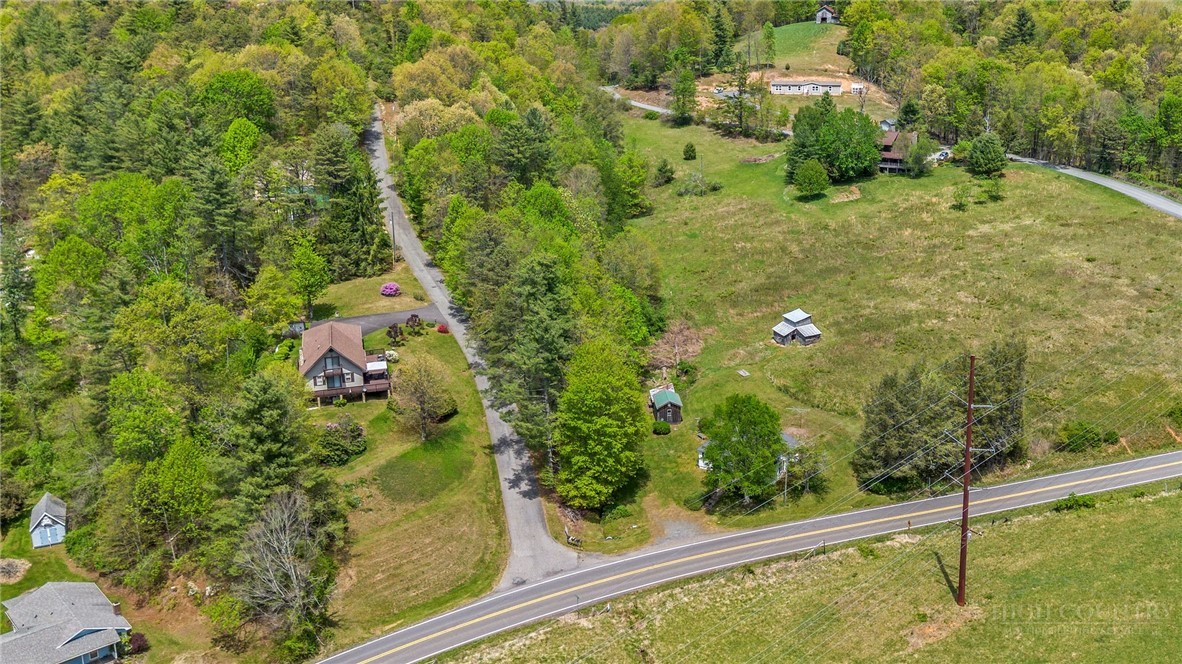 2284 Idlewild Road West Jefferson, NC 28694 - Photo 6 of 23 a view of a garden from a window
