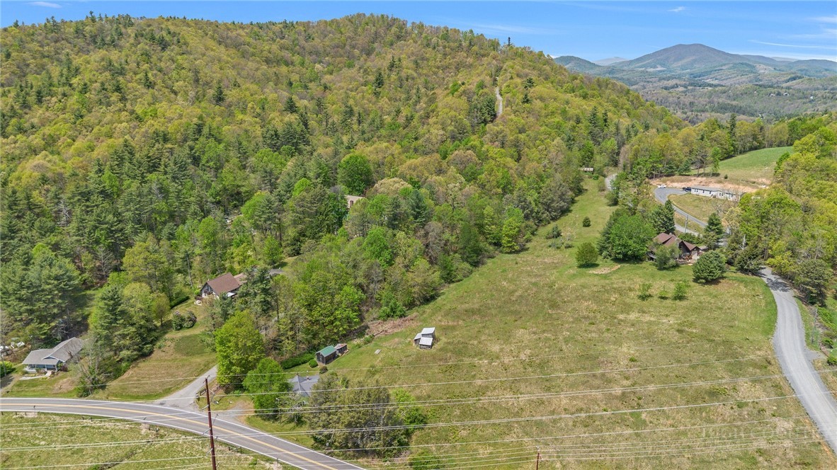 2284 Idlewild Road West Jefferson, NC 28694 - Photo 7 of 23 a view of a yard with an outdoor seating