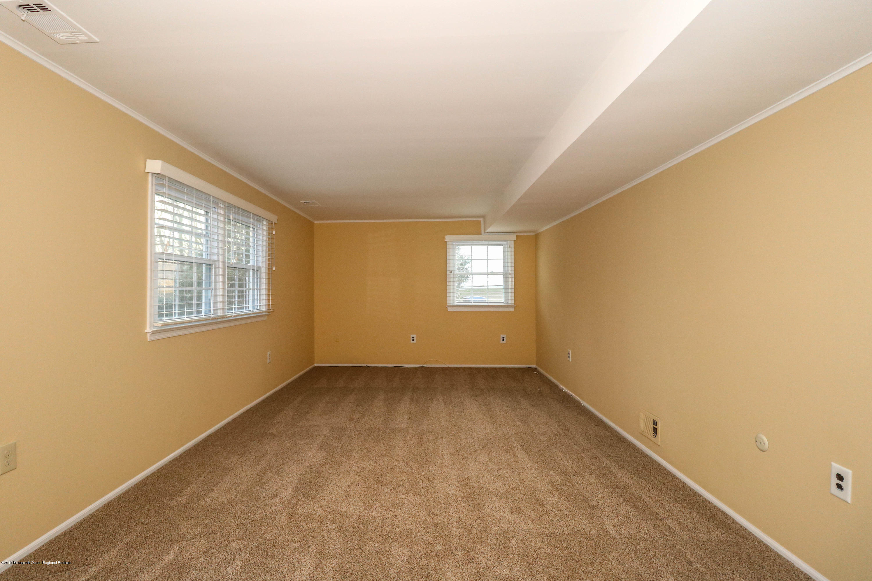15 Middlebrook Drive Asbury Park, NJ 07712 - Photo 21 of 39 an empty room with windows