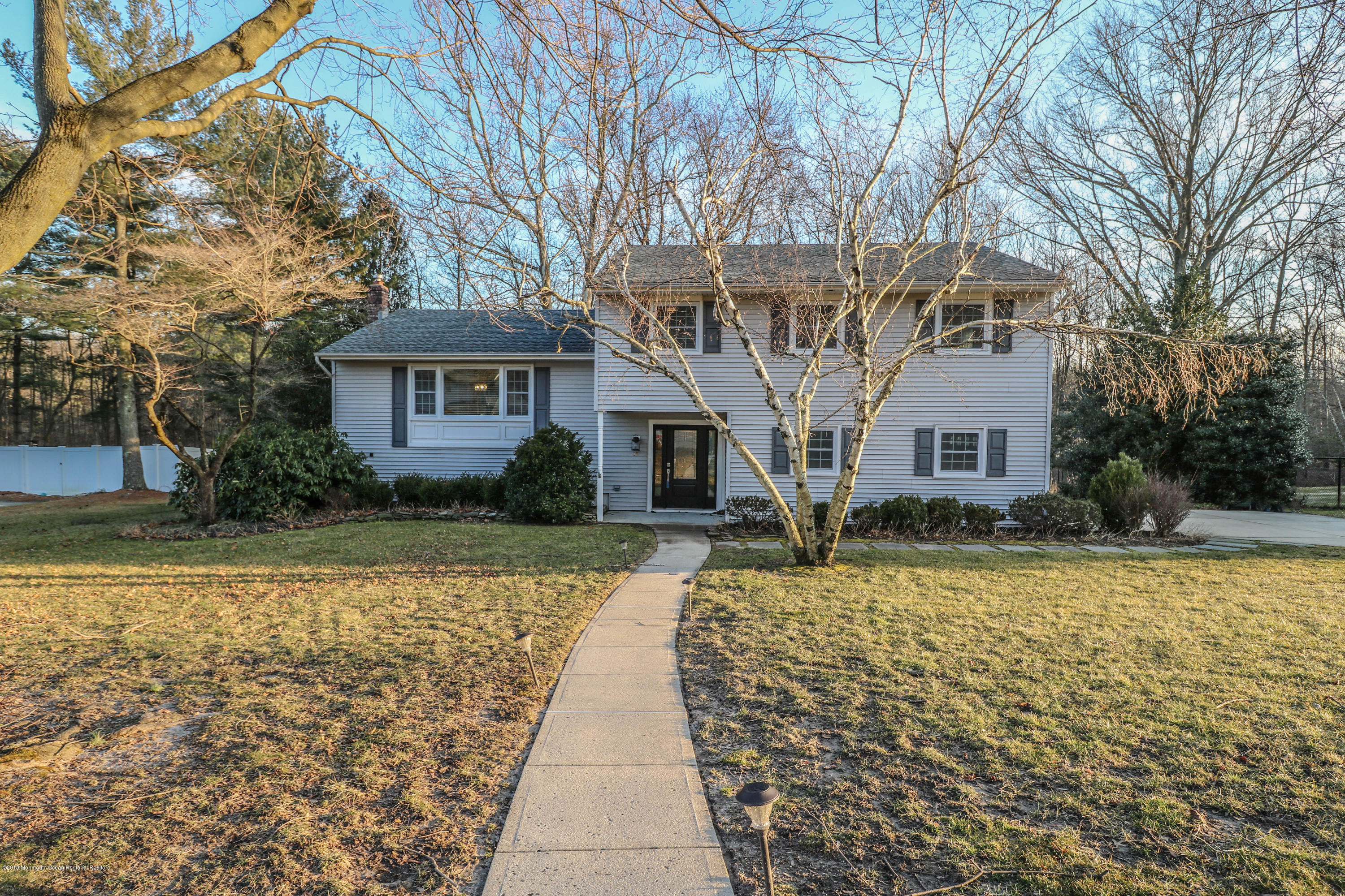 15 Middlebrook Drive Asbury Park, NJ 07712 - Photo 39 of 39 a front view of a house with a yard