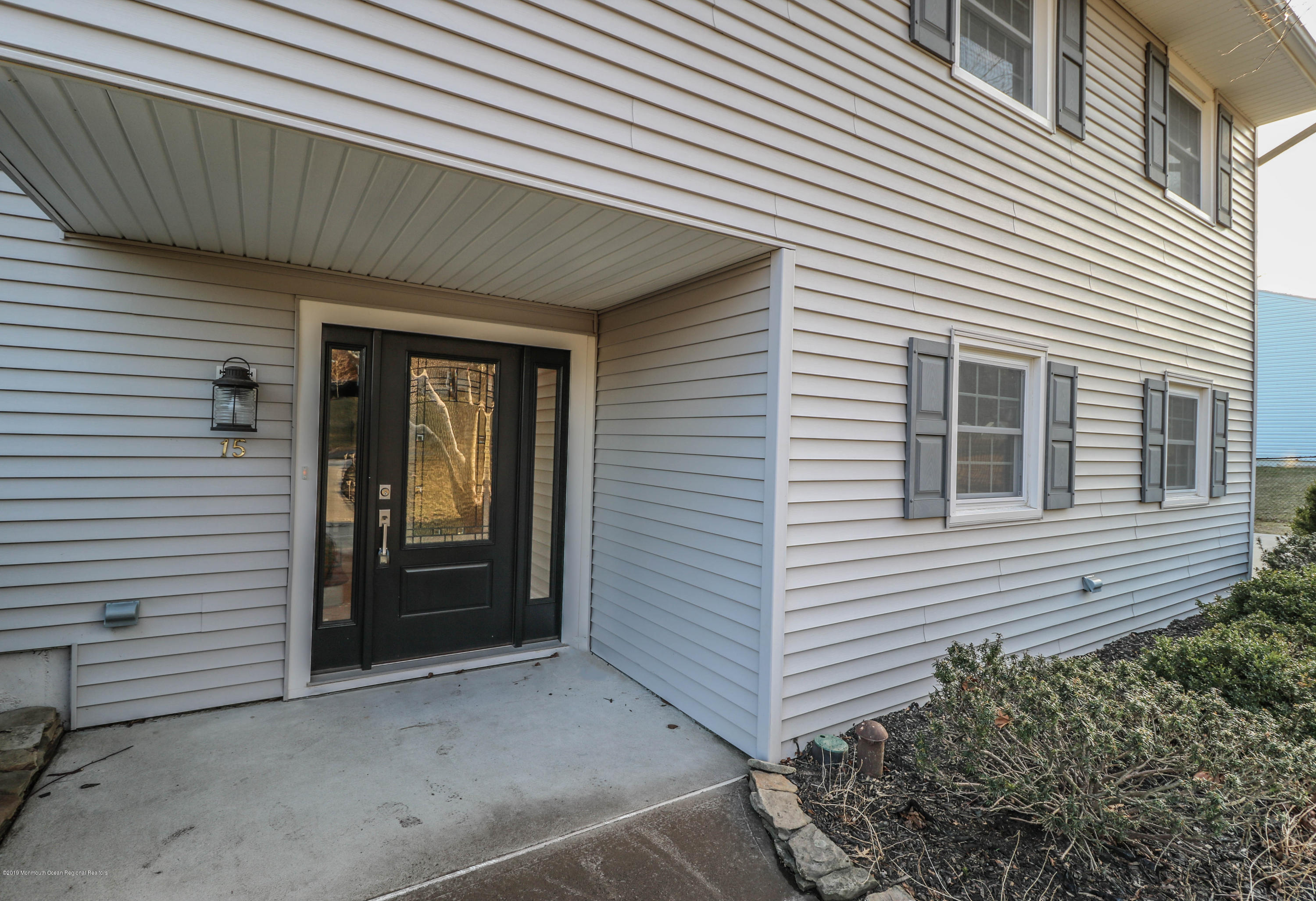 15 Middlebrook Drive Asbury Park, NJ 07712 - Photo 4 of 39 a view of a house with a door and a large window