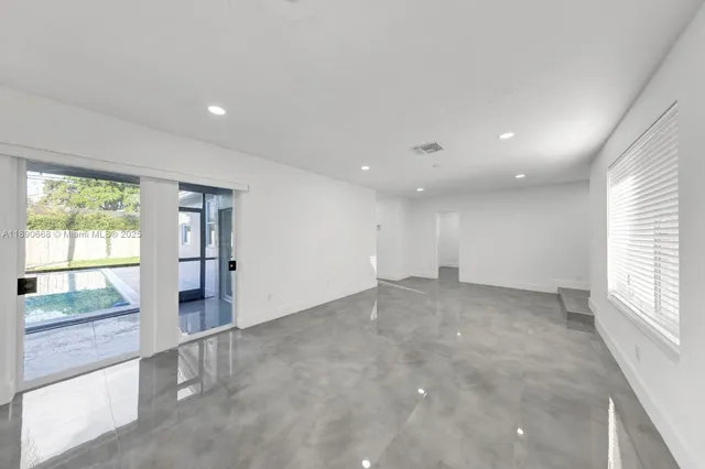 a view of empty room with a window