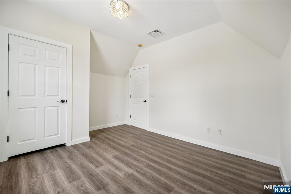 534 Durie Avenue, Unit 3 Closter, NJ 07624 - Photo 17 of 32 a view of an empty room with wooden floor