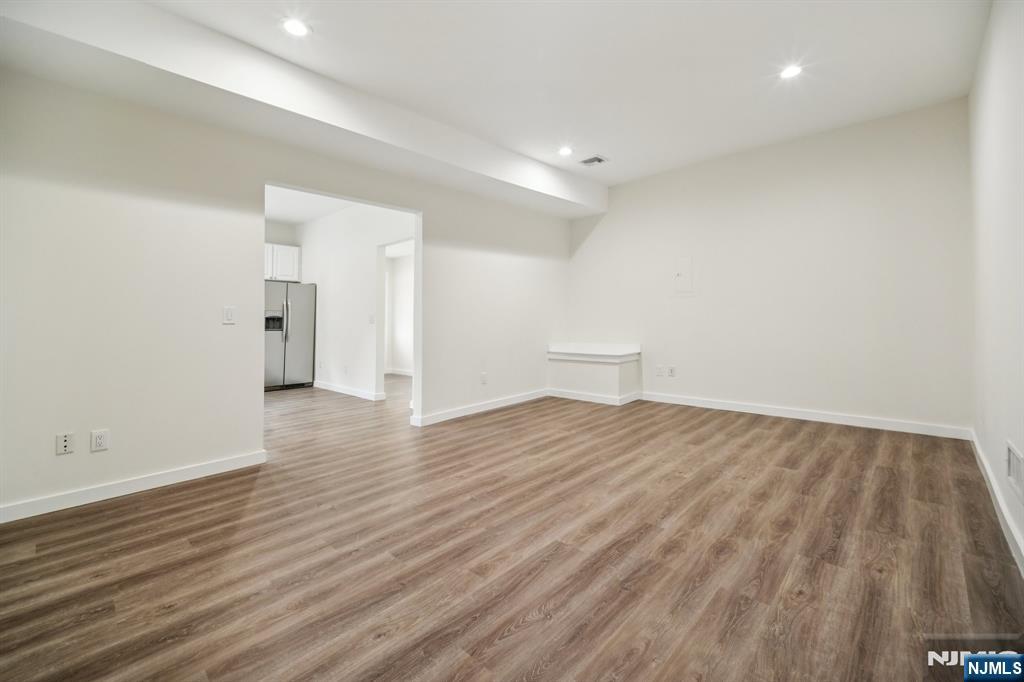 534 Durie Avenue, Unit 3 Closter, NJ 07624 - Photo 28 of 32 a view of empty room with wooden floor