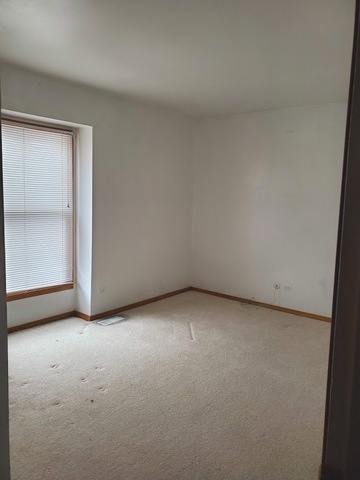 324 Inverrary Lane, Unit D Deerfield, IL 60015 - Photo 21 of 32 a view of an empty room and entryway