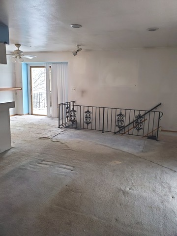 324 Inverrary Lane, Unit D Deerfield, IL 60015 - Photo 10 of 32 a view of an empty room with a window