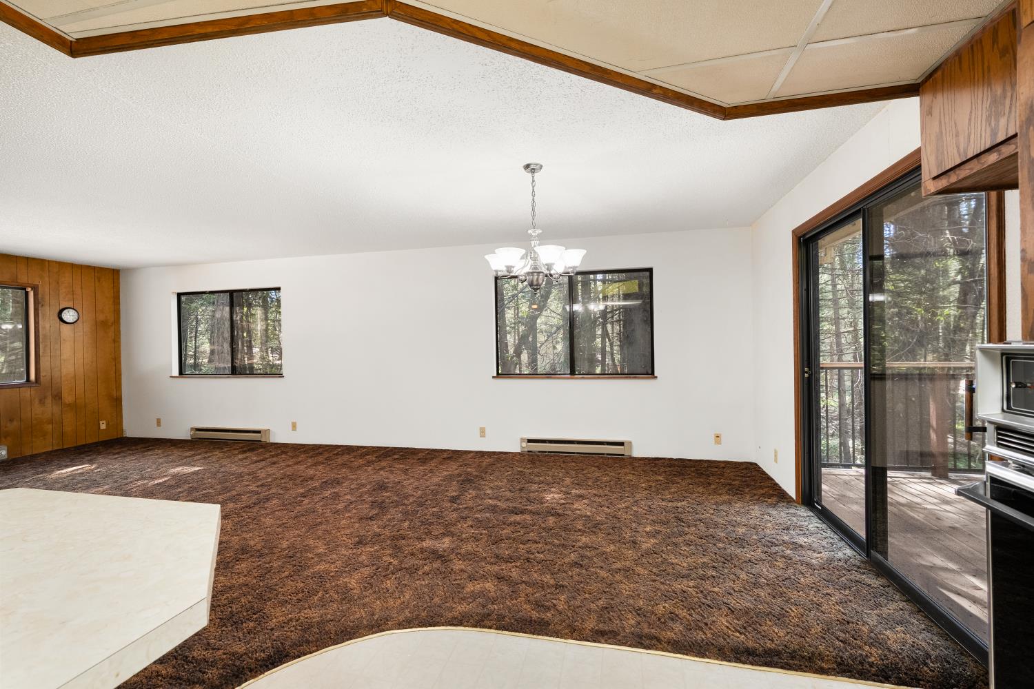 22945 Foresthill Road Foresthill, CA 95631 - Photo 24 of 63 a view of an empty room with window and wooden floor