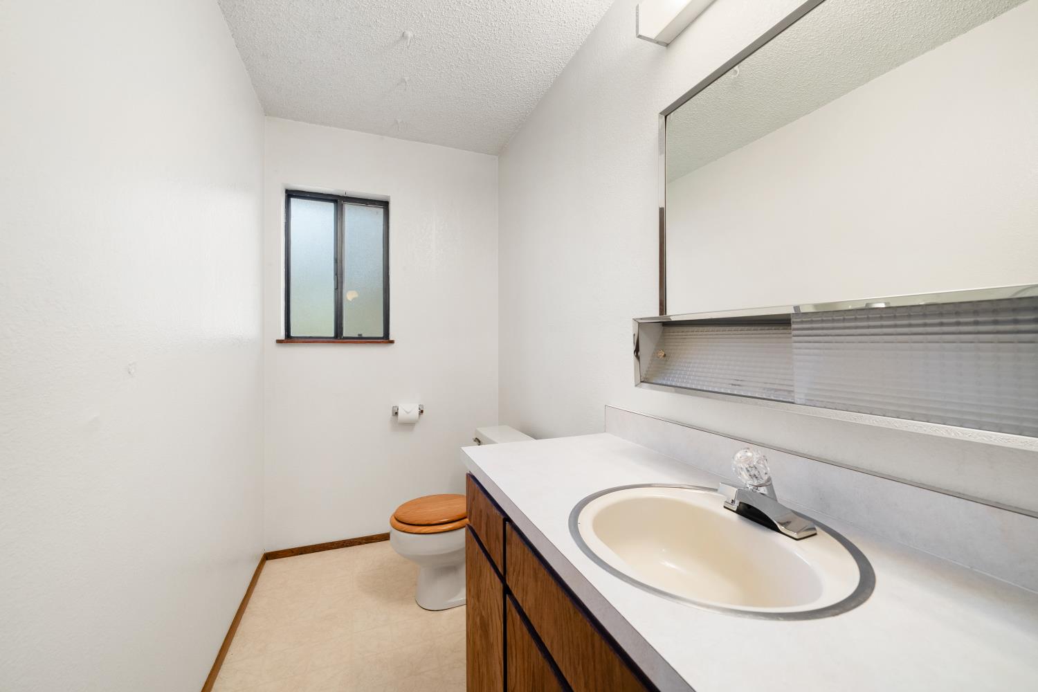 22945 Foresthill Road Foresthill, CA 95631 - Photo 39 of 63 a bathroom with a sink and a toilet