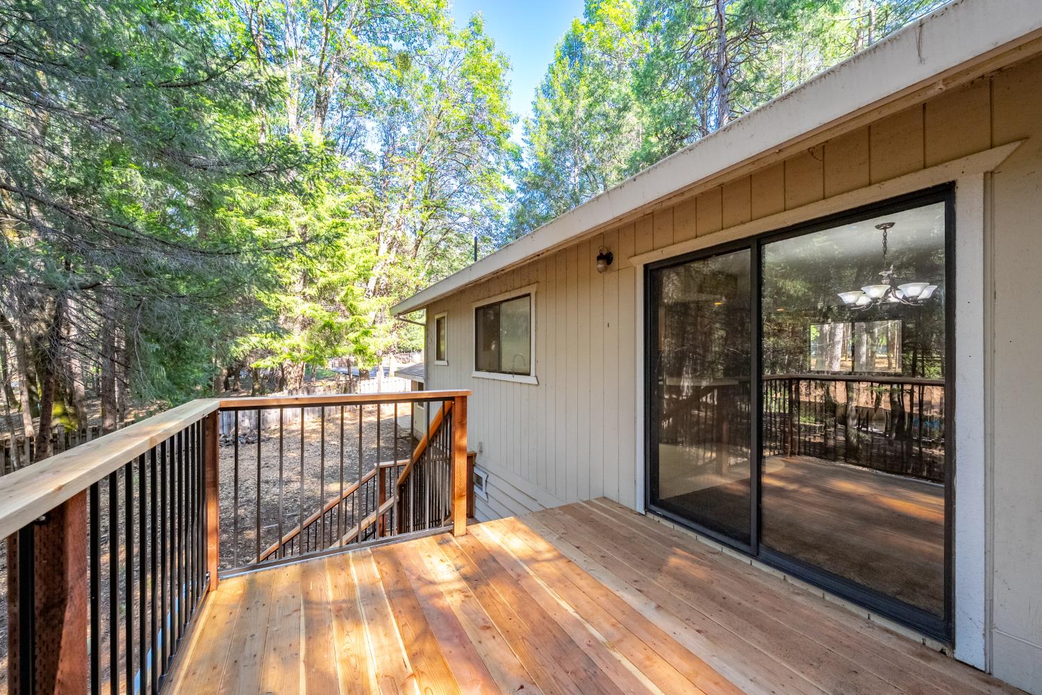22945 Foresthill Road Foresthill, CA 95631 - Photo 43 of 63 a view of balcony with floor to ceiling window and wooden fence